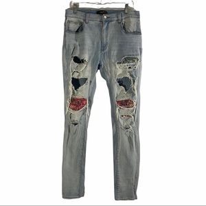 Amiri distressed jeans w/pink, blue, green patches